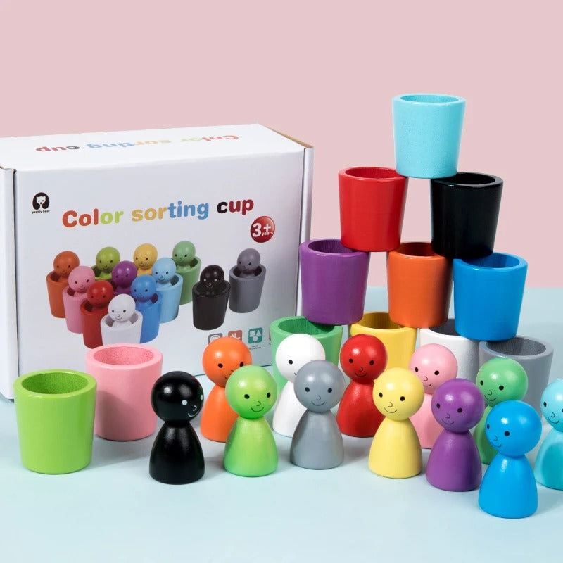 Bonecas de madeira em copos para classificação de cores, brinquedo Montessori da Zem Kids para coordenação motora fina.
