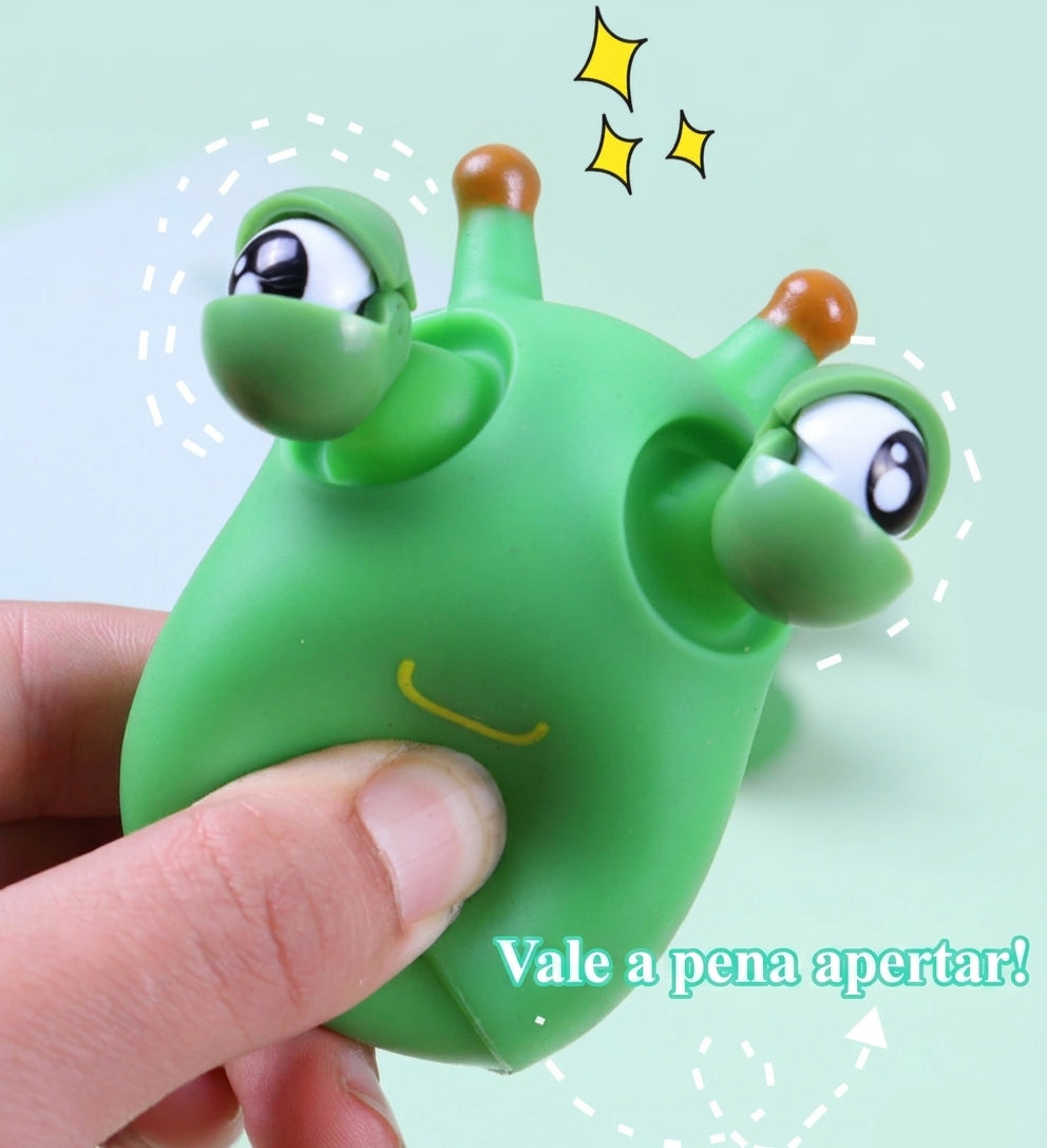 Kit com 3 brinquedos sensoriais Minhoca Verde de Apertar da Zem Kids, com olhos saltadores antiestresse e design colorido.