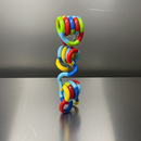 Kit com 3 brinquedos Twist Fidget sensoriais da Zem Kids, para foco e coordenação, em cores variadas.