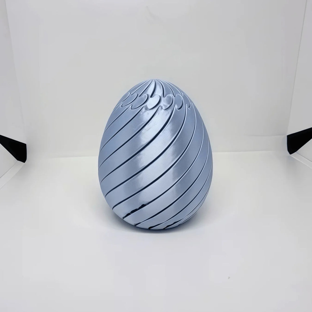 Brinquedo sensorial Ovo Articulado Geométrico 3D da Zem Kids, fidget toy anti-estresse, com acabamento dourado Silk Gold