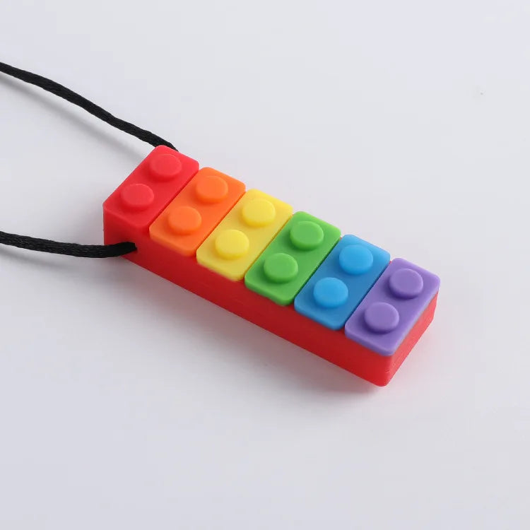 Colar mordedor sensorial em silicone Zem Kids com bloco regulador para autismo, TDAH e ansiedade, ideal para estímulo sensorial.