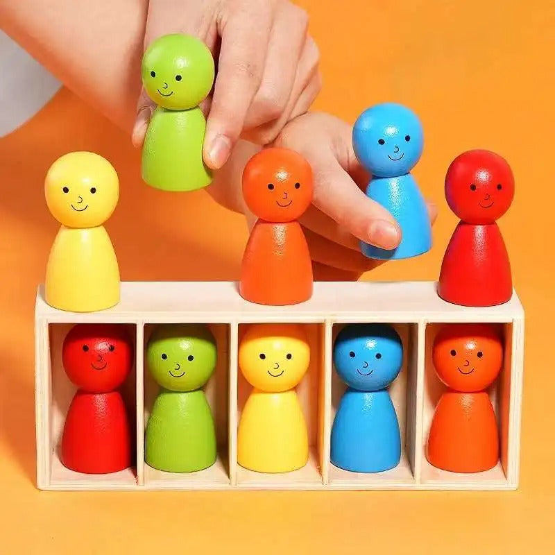 Brinquedo Montessori Zem Kids com bonecas de madeira em copos para classificação de cores e coordenação motora fina.