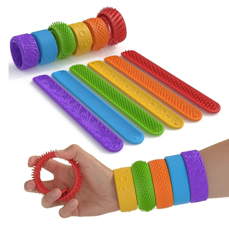 Kit com 6 pulseiras sensoriais Slap da Zem Kids, brinquedos de silicone para estímulo autismo, TDAH e regulação tátil.